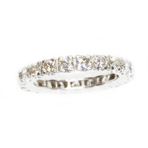 592 - A diamond eternity band, twenty one round brilliant cut diamonds weighing approximately 1.68cts in t... 