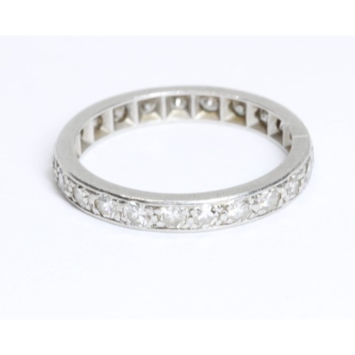 593 - An early to mid 20th century diamond eternity band, twenty three single cut stones weighing approxim... 