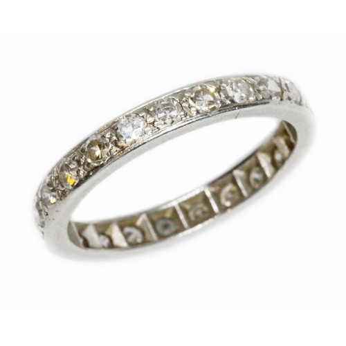 593 - An early to mid 20th century diamond eternity band, twenty three single cut stones weighing approxim... 