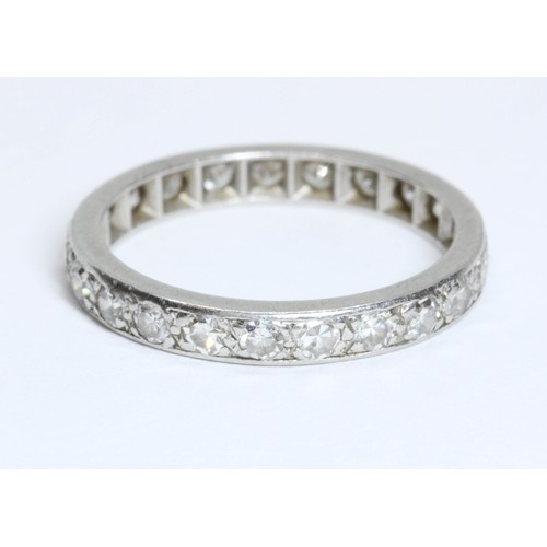 593 - An early to mid 20th century diamond eternity band, twenty three single cut stones weighing approxim... 