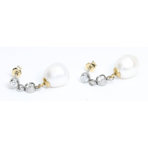 612 - A pair of cultured pearl and colourless stone earrings, the butterflies marked 'au750' only, gross w... 