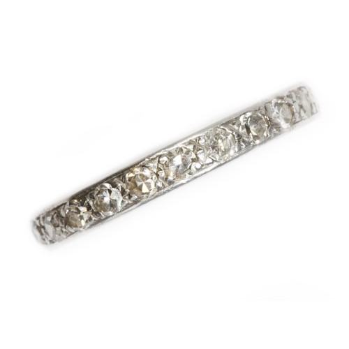 593 - An early to mid 20th century diamond eternity band, twenty three single cut stones weighing approxim... 