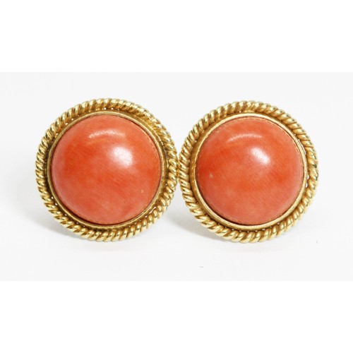 599 - A pair of 14ct gold coral cabochon earrings, diameter 14mm, import marks to posts, gross weight 4.4g... 