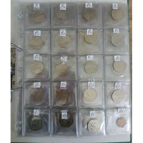 570 - A folder of coins including collectable 50ps.