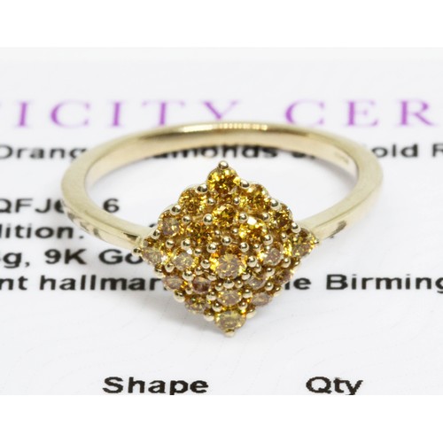 623 - A 9ct gold fancy coloured 'Imperial' orange diamond cluster ring, gross weight 1.8g, size L, with Ge... 