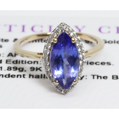 621 - A 9ct gold tanzanite and white zircon cluster ring, gross weight 2.2g, size L, with Gemporia certifi... 