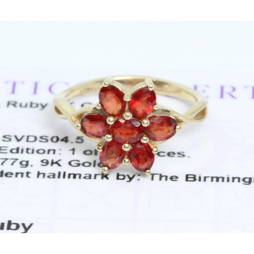 647 - A 9ct gold Winza ruby clluster ring, gross weight 1.9g, size J, with Gemporia certificate.