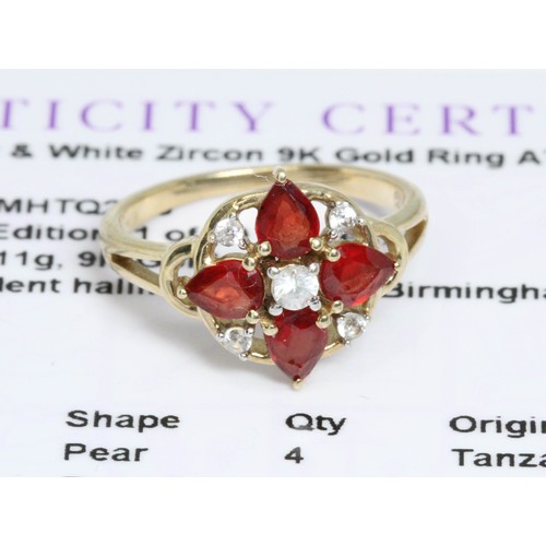 645 - A Songea ruby and white zircon cluster ring, gross weight 2.1g, size J, with Gemporia certificate.