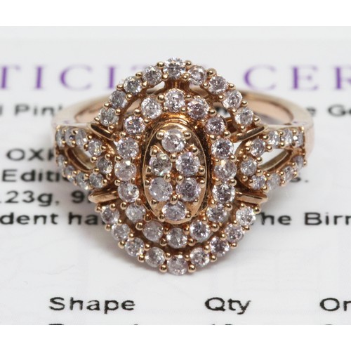 632 - A 9ct rose gold and tinted pink diamond ring, the cluster measuring approximately 16mm x 11mm, gross... 