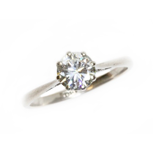 661 - A diamond solitaire ring, the eight claw set round brilliant cut stone weighing approximately 1ct, d... 