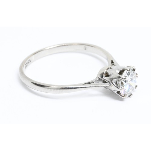 661 - A diamond solitaire ring, the eight claw set round brilliant cut stone weighing approximately 1ct, d... 