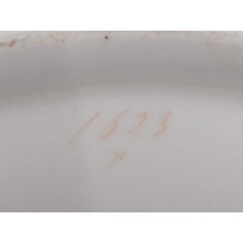 601 - A pair of 19th century Davenport china plates, each decorated with a scene depicting a Scottish Loch