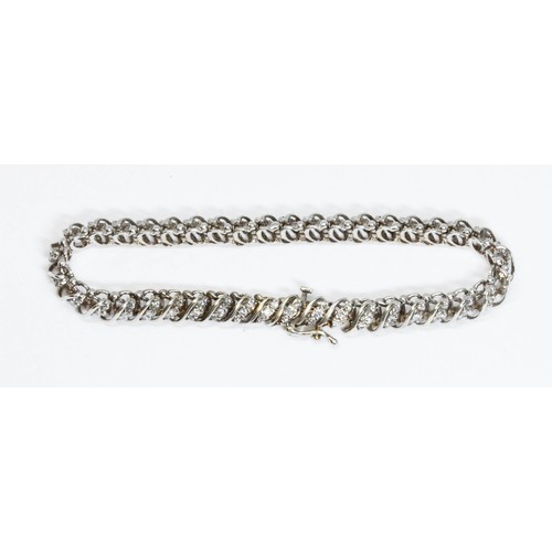 669 - A 9ct white gold diamond bracelet, 120 round brilliant cut melee diamonds weighing approximately 2ct... 