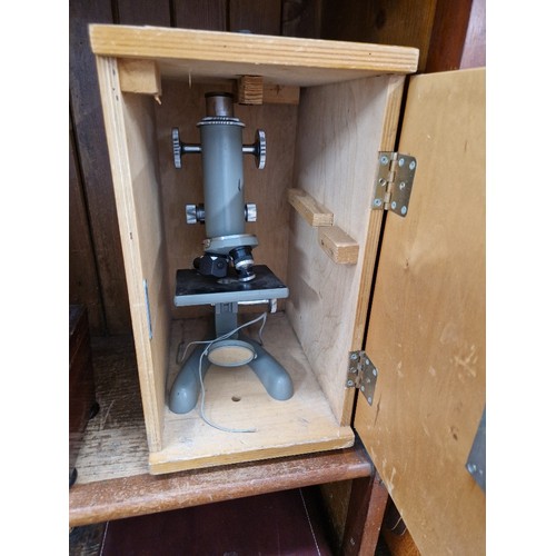 37 - A Beck London microscope in wooden case.