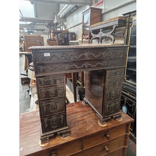 851 - An Edwardian Neo-Classical style knee hole desk, width 86cm, depth 49cm & height 81cm.