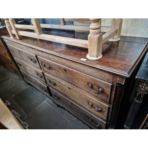 860 - A George III mahogany mule chest with fluted columns and ogee bracket feet, length 183cm, depth 56cm... 