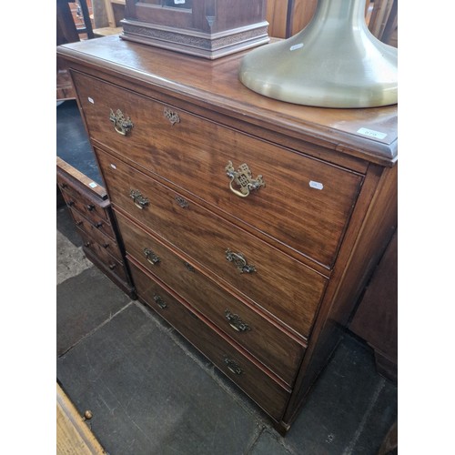 879 - An Edwardian mahogany chest of drawers, width 99cm, depth 52cm 7 height 130cm.