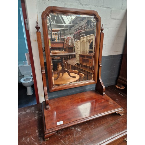 889 - An early 20th century mahogany toilet mirror, height 79cm.