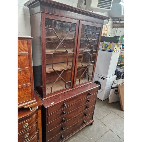 893 - A Georgian mahogany secretaire cabinet bookcase, second quarter of the 19th century, width 133cm, de... 