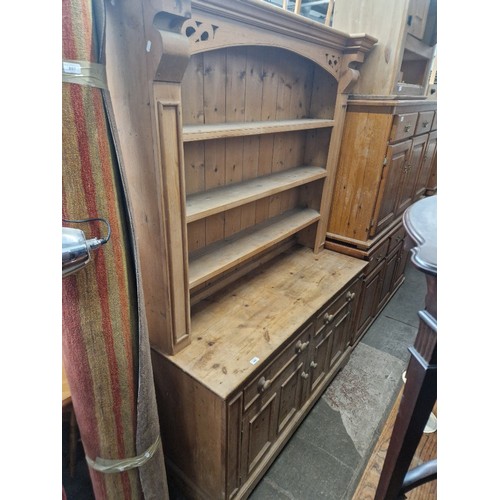 898 - A pine dresser, width 147cm, depth 54cm & height 206cm.