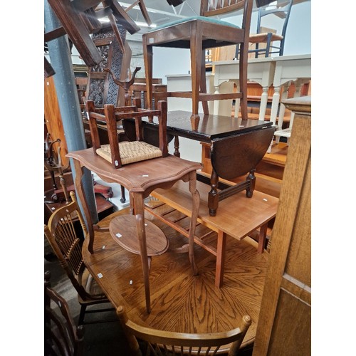 919 - Assorted furniture comprising an American style table and chairs, three occasional tables, a chair a... 