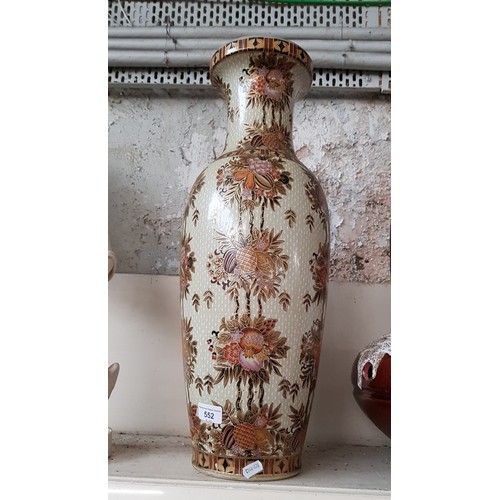 552 - A Chinese vase decorated with flowers, height 60cm.