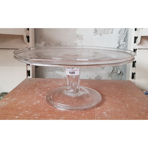 600 - A George III glass tazza on raised footed base, diameter 32cm and height 14cm.