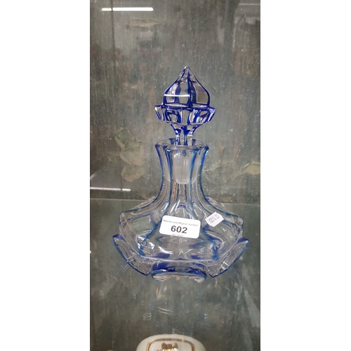 602 - A 19th century blue and clear glass cologne/perfume decanter.