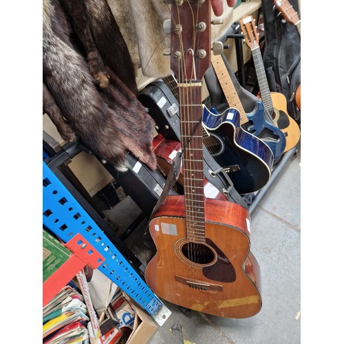 163 - A Yamaha FG-200 steel strung acoustic guitar.