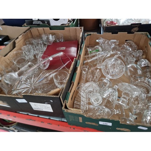 146 - Two boxes of mostly cut crystal glassware.