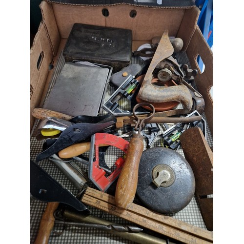 151 - A box of vintage tools.