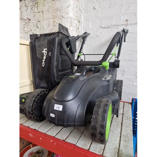 116 - A Gtech cordless lawnmower with battery and charger.