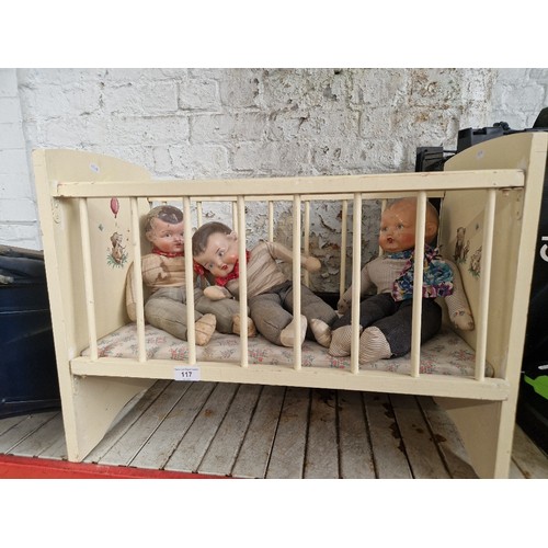 117 - Three vintage dolls, circa 1920s/1930s and a doll's crib.