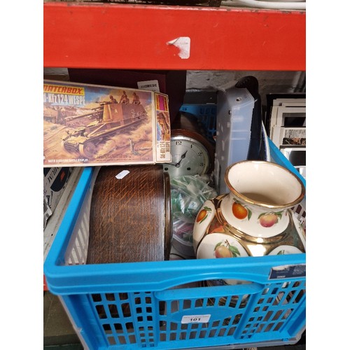 101 - A box of mixed items including two mantel clocks, a box of 1992 Preston Guild tanker and pottery.