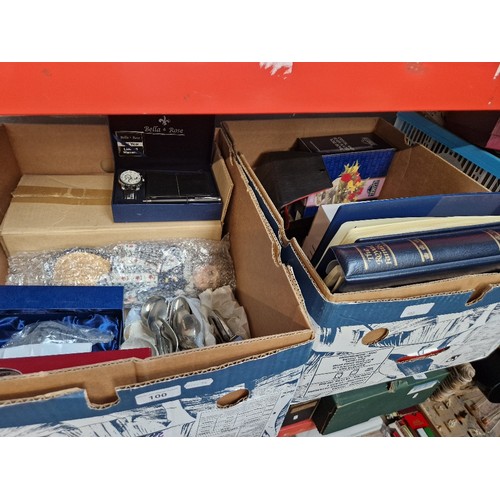 100 - Two boxes of assorted including two albums of The Royal Family coin covers and mint stamps, a watch ... 