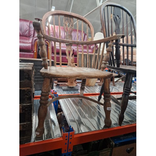 966 - A 19th century elm Windsor chair with crinoline stretcher.