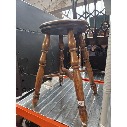 959 - A Victorian beech and elm stool.