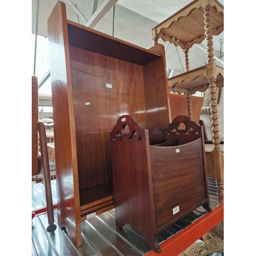 973 - A mahogany magazine rack and a bookcase.