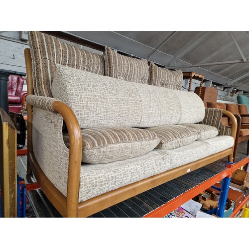 977 - A mid 20th century Cintique three seater sofa.