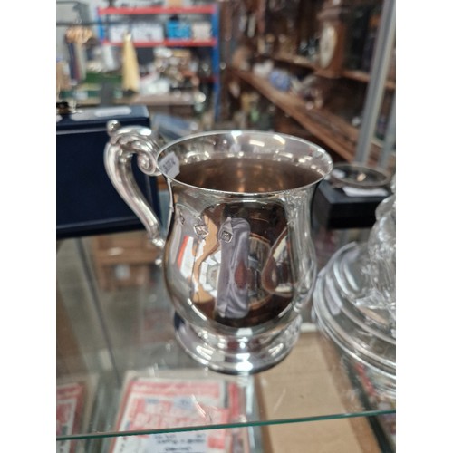 458 - A hallmarked silver tankard, height 12cm, gross weight 294g.