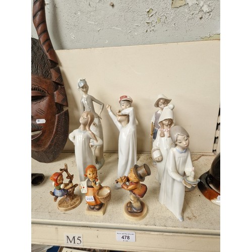 478 - Eight Lladro figurines together with three Goebel figures.