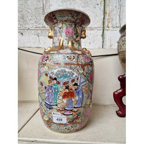 459 - A Chinese Famille Rose vase, gilt decorated with flowers, butterflies and Chinese figures, height 36... 