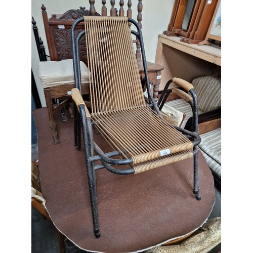 992 - A pair of mid 20th century tubular metal framed chairs.