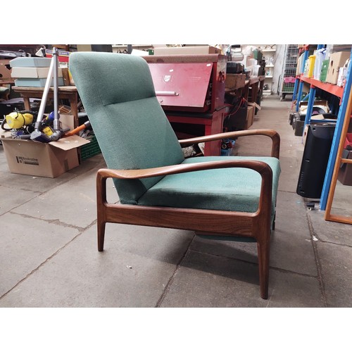 979 - A mid 20th century teak lounge armchair.