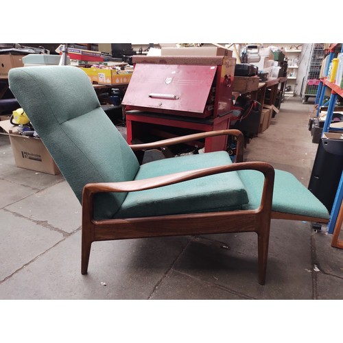 979 - A mid 20th century teak lounge armchair.