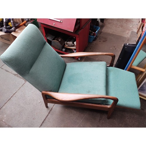 979 - A mid 20th century teak lounge armchair.