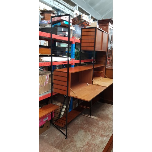 996 - A Staples Ladderax unit comprising three tall and one short metal ladder, drop front cabinet, shelve... 