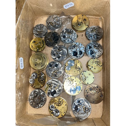 693 - A box of pocket watch movements.