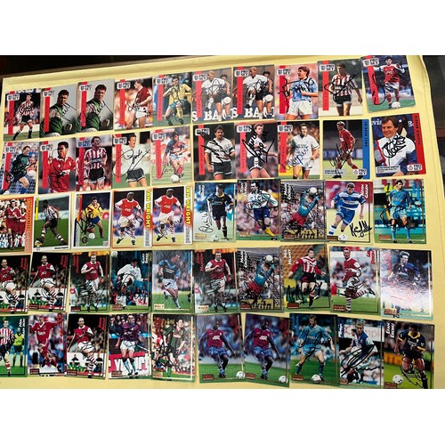 710 - A box of several hundred football cards, many of them are signed and from a personal collection.