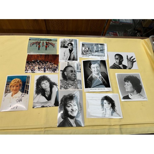 102 - A box of assorted press photographs.